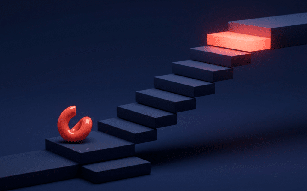 Red curved sculpture sits on a dark blue staircase that rises toward a glowing red block at the top, symbolizing progress toward a goal.